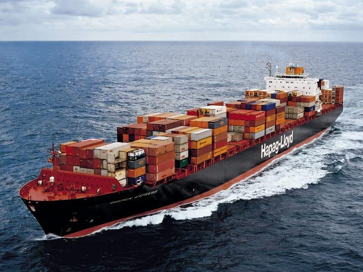 Fully laden container vessel under way at sea